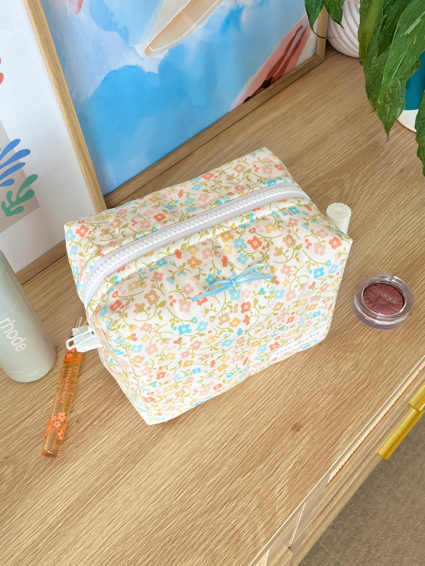 The Hailey Makeup Bag with blue bow