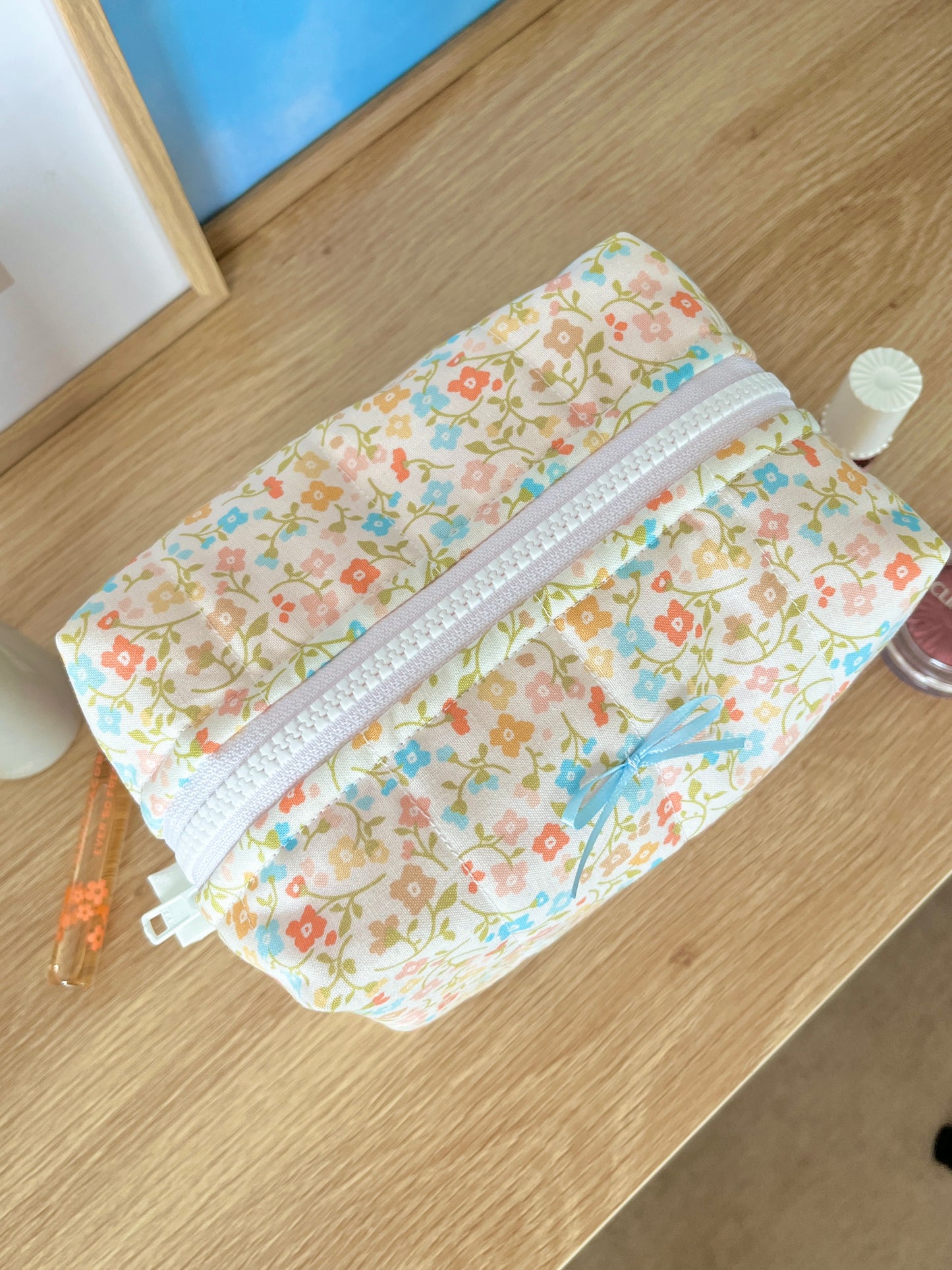 The Hailey Makeup Bag with blue bow