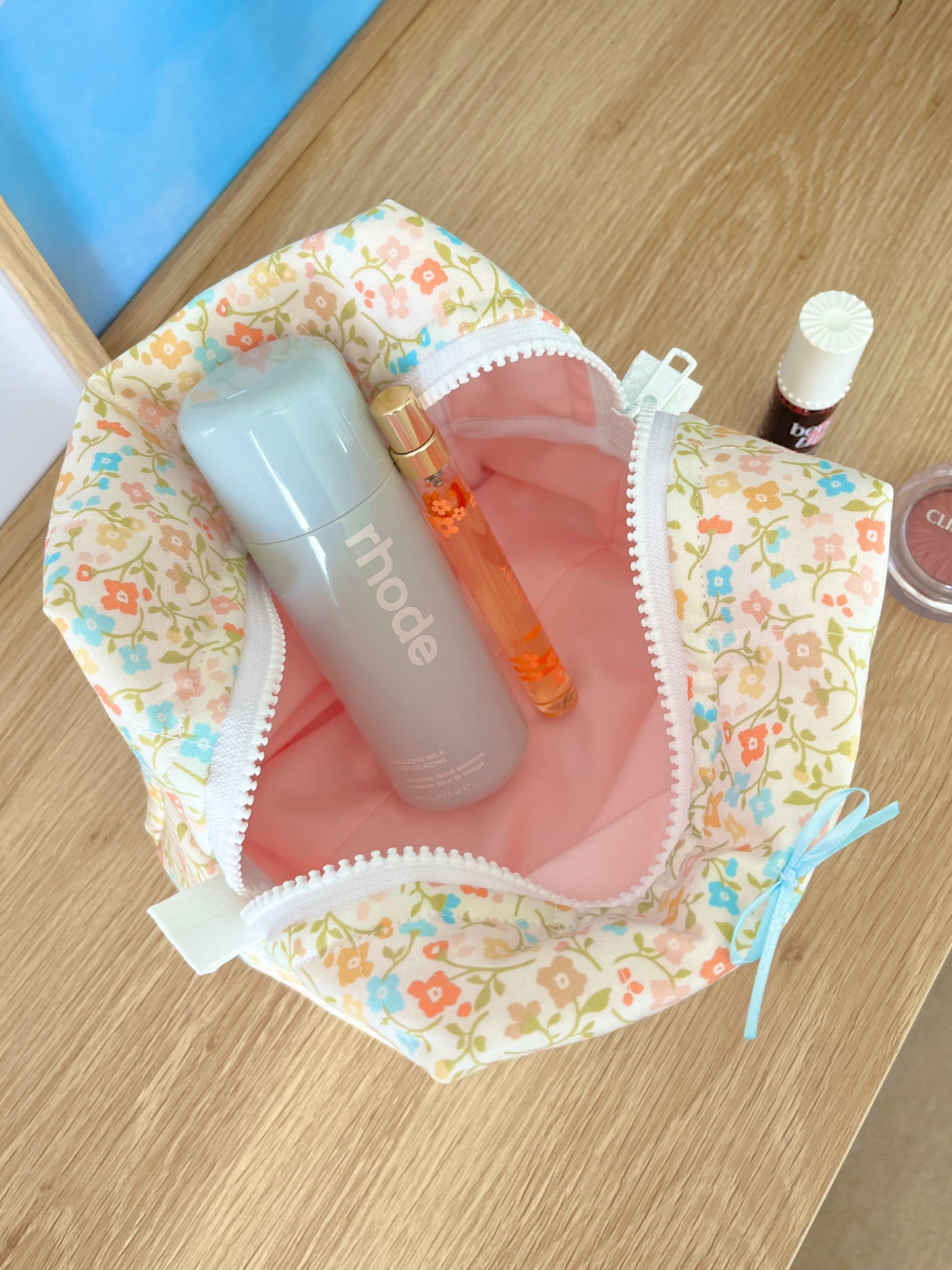The Hailey Makeup Bag with blue bow