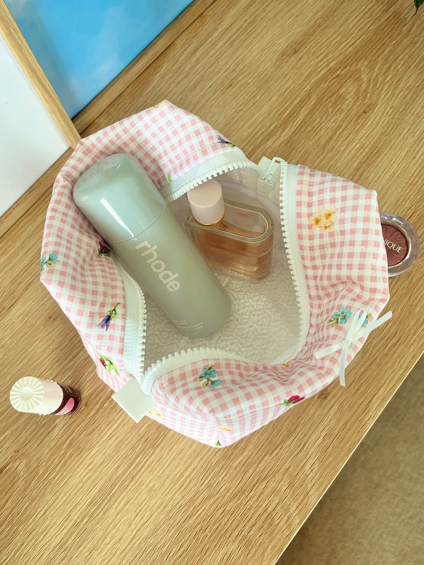 The Lucy Makeup Bag with white bow