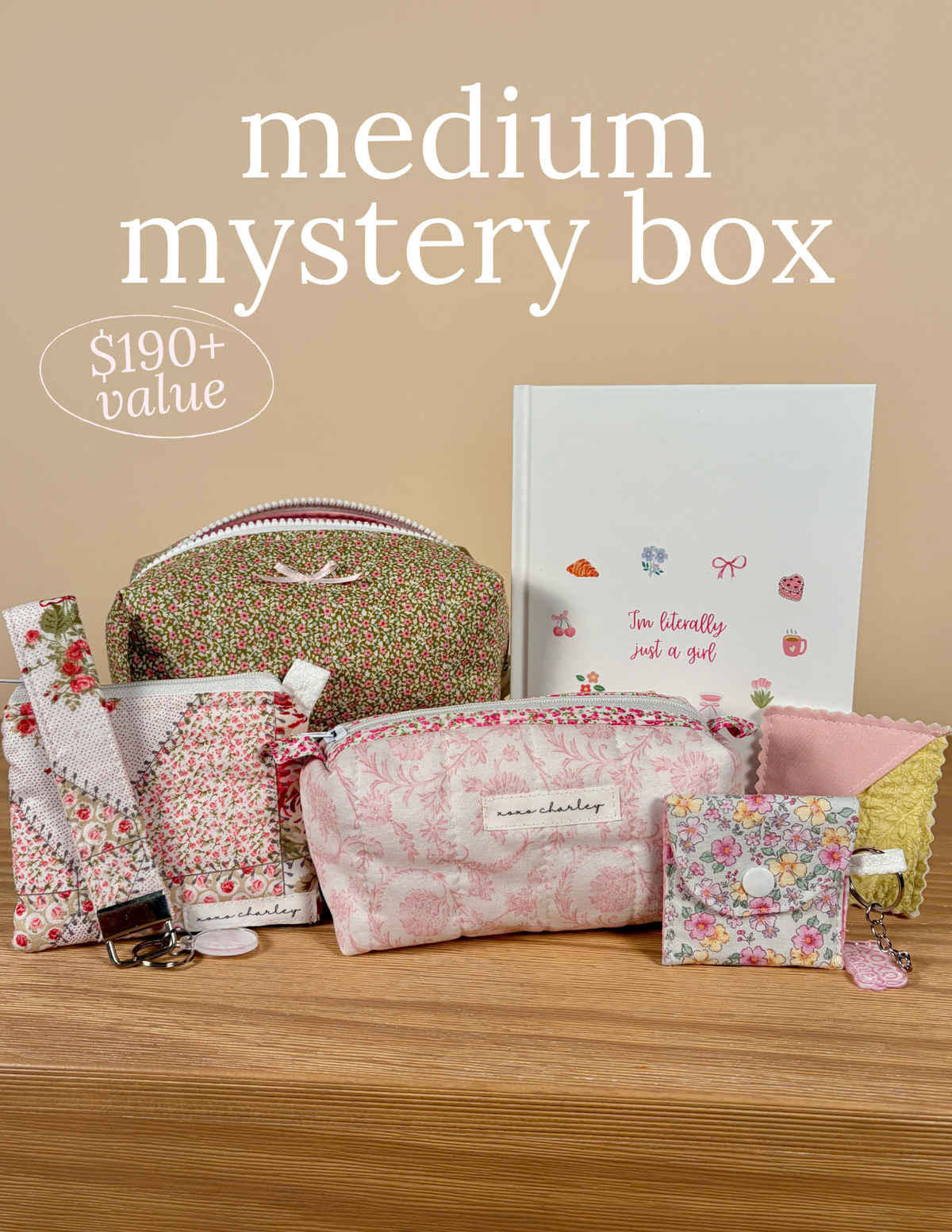 Medium mystery box with pink and multicolor fabric items, pouches and pillow covers