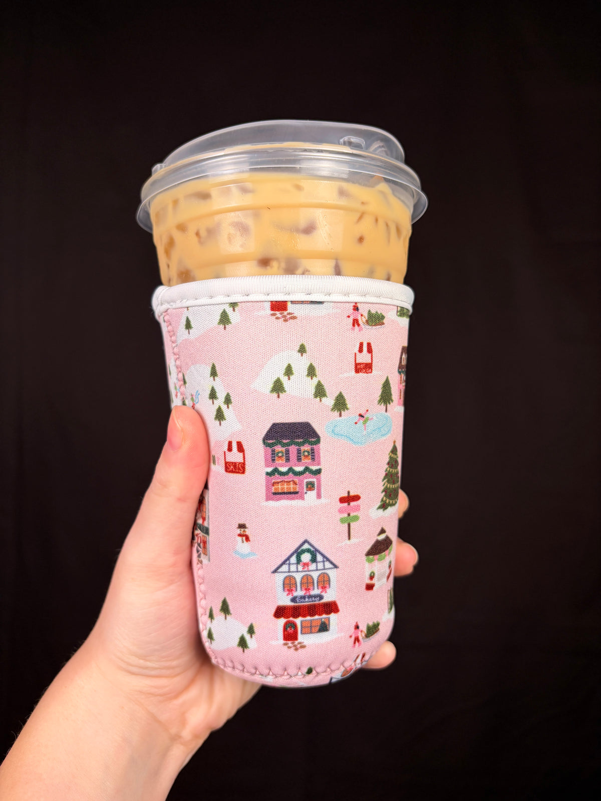 Medium cottage cup sleeve with stitched edges, pink winter village print