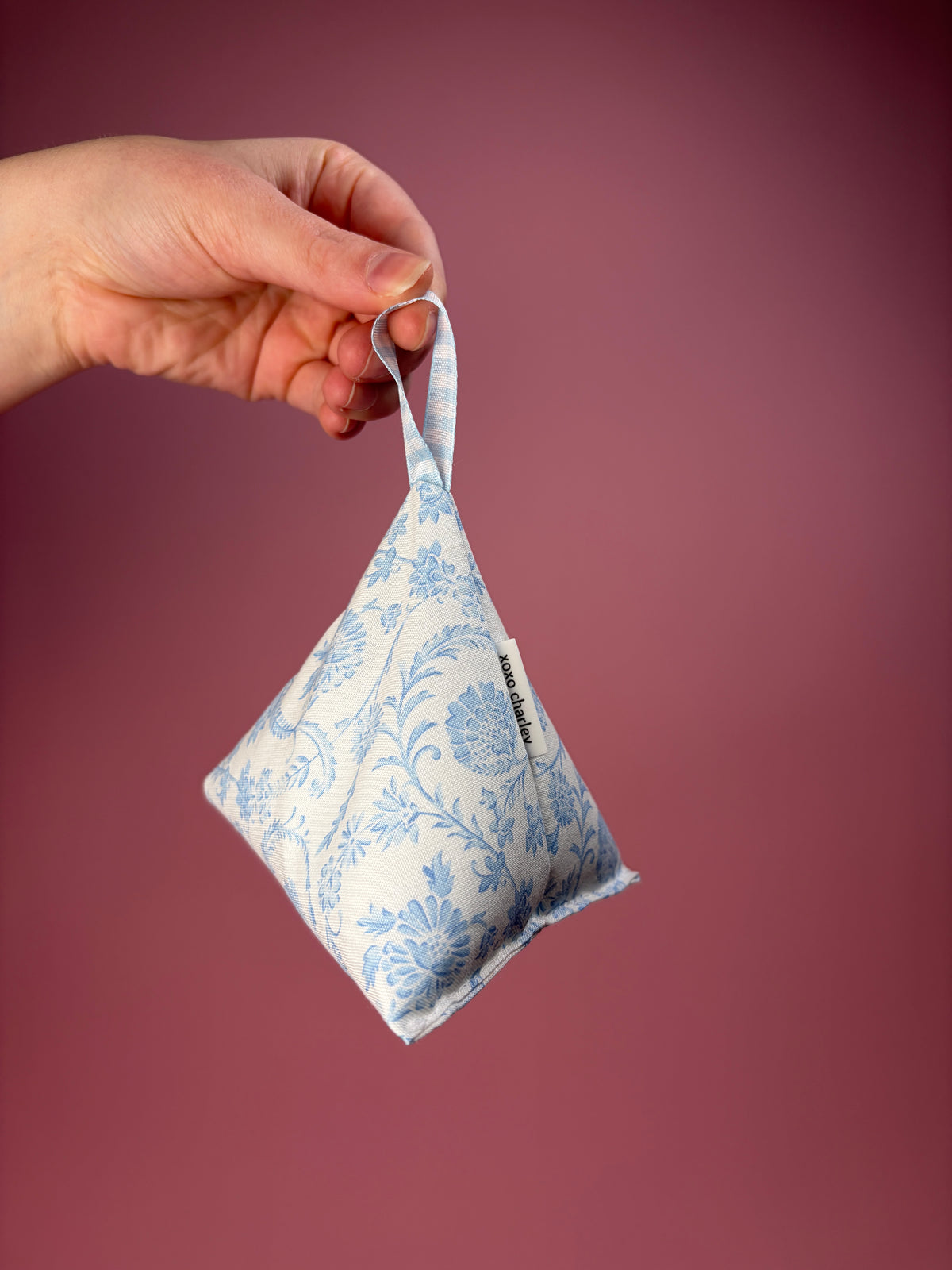 Vintage blue pattern weight: blue floral print pouch with ribbon loop handle