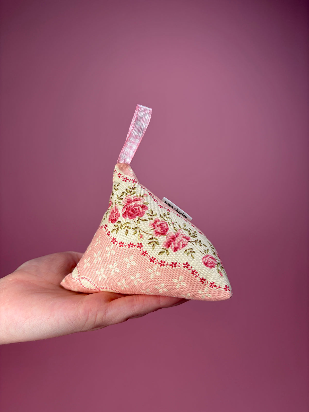 Floral hanging weight pouch with pink check ribbon loop