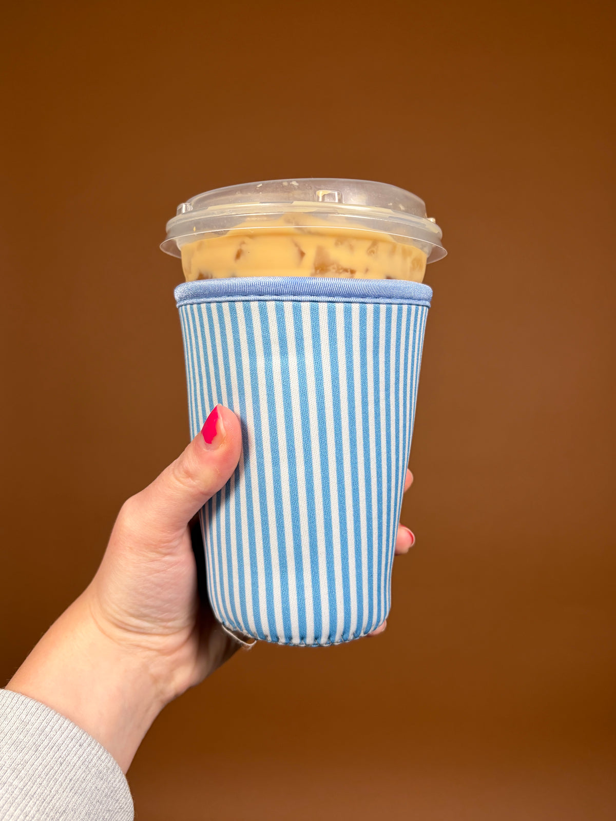 Blue striped cup sleeve for hot cups