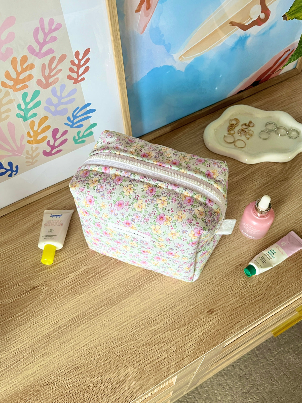 Primrose medium makeup bag with colorful floral print and silver zipper trim