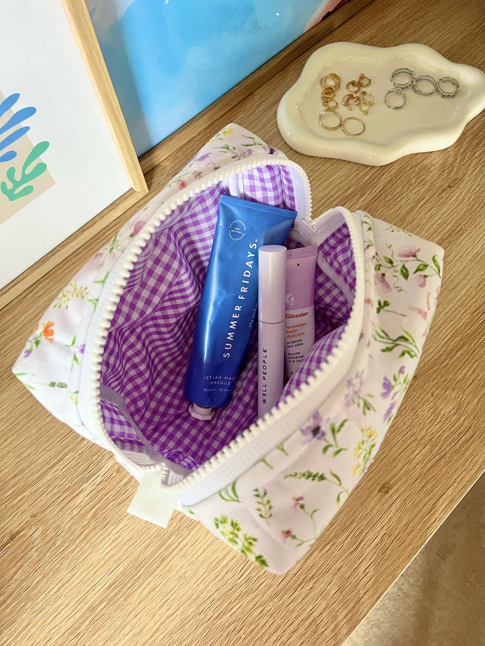 Medium wildflower makeup bag with purple interior, open-top floral pouch