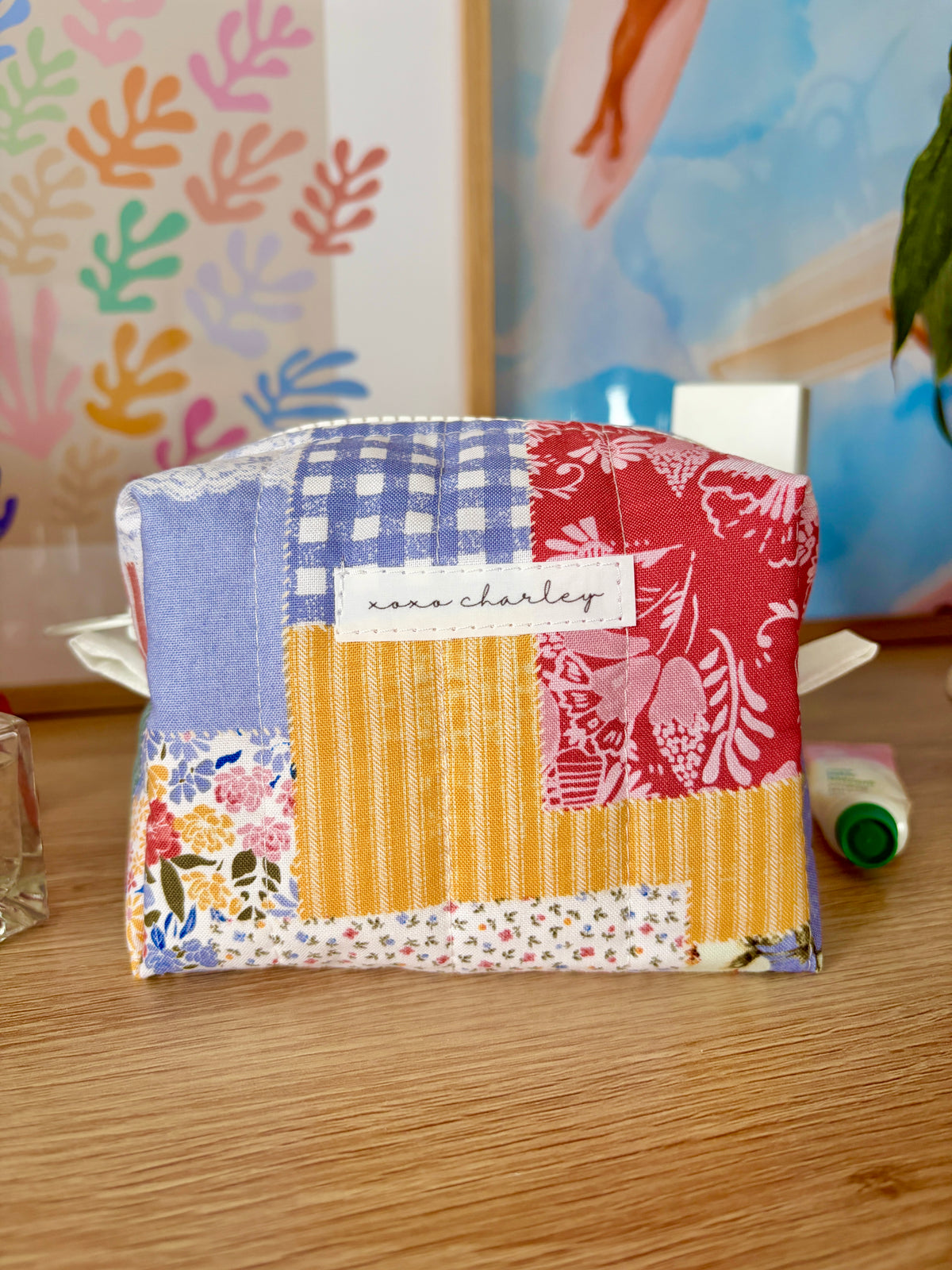 Patchwork mini makeup bag with zipper, blue red green and yellow fabric panels