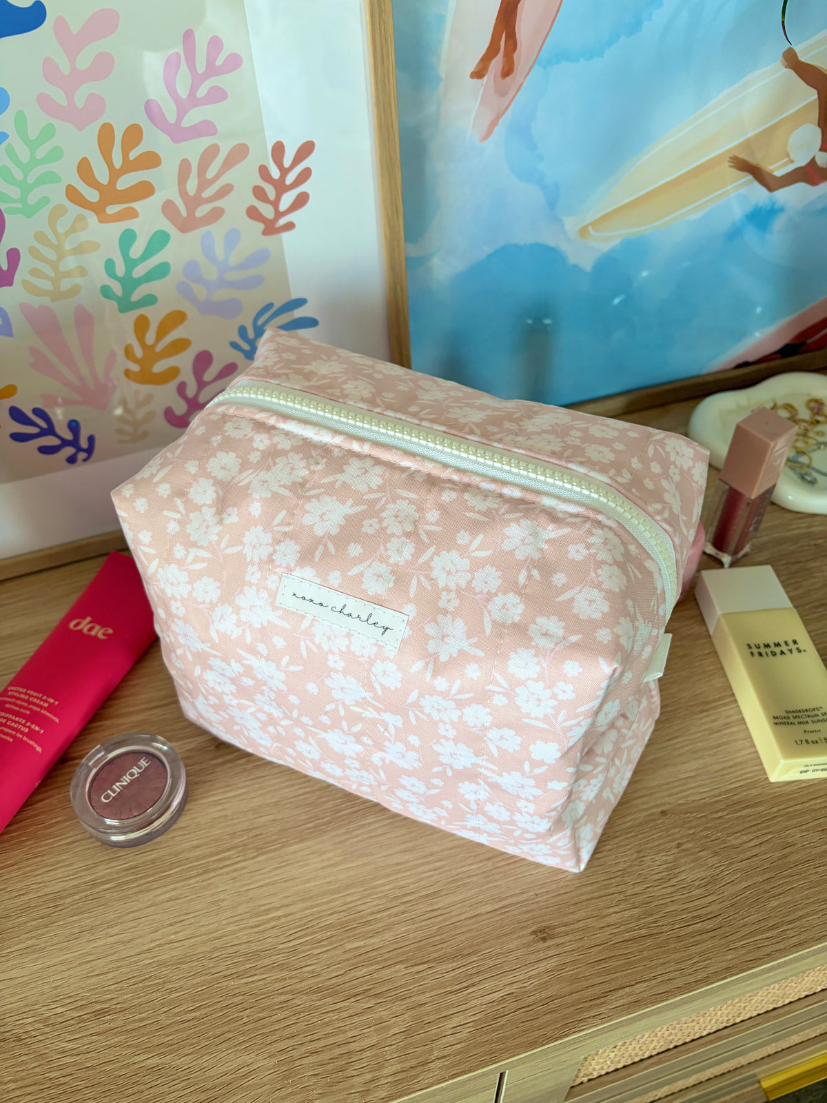 Floral large makeup bag in light pink with white floral print and mint zipper
