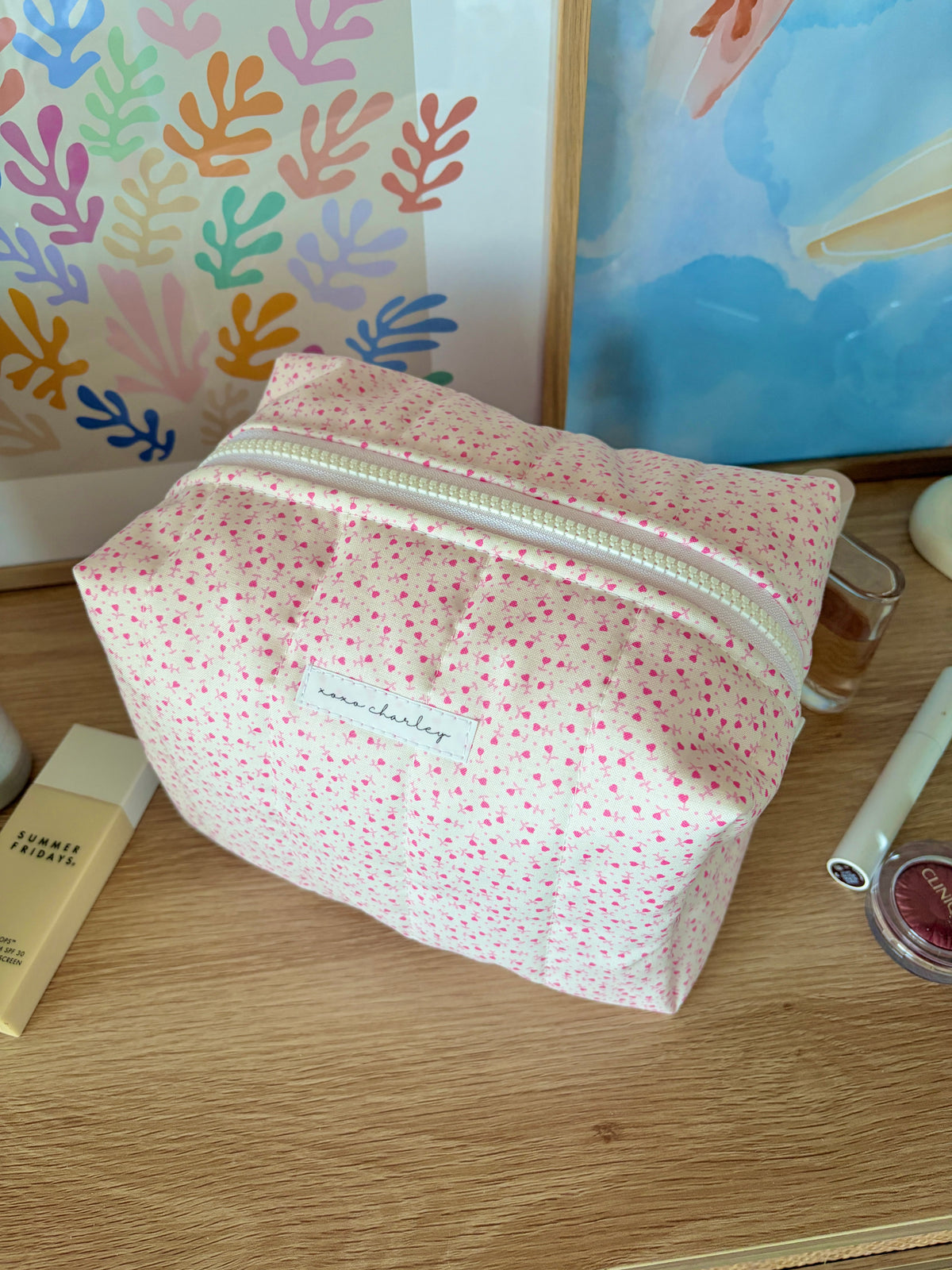 Large makeup bag in pink fabric with tiny heart print, silver zipper