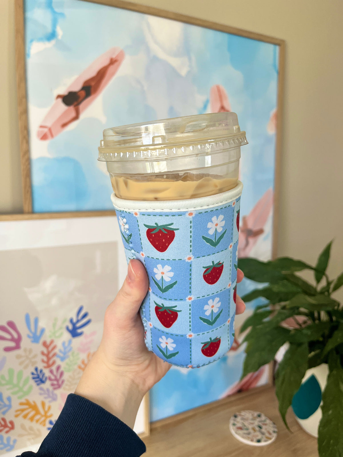 Medium blue spring cup sleeve with strawberry, tulip, and flower square pattern