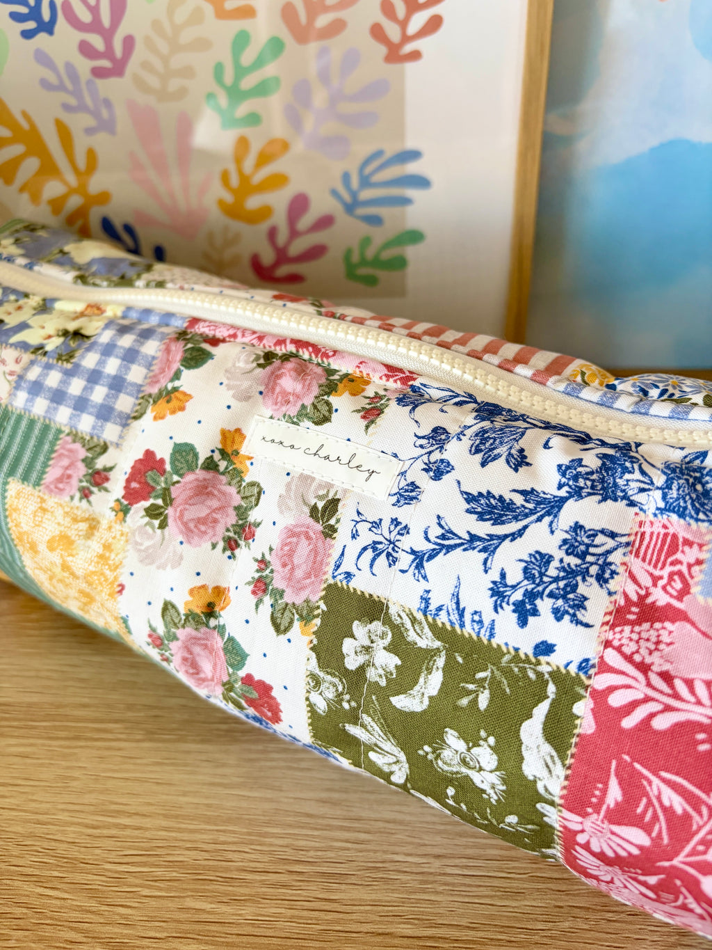 Large patchwork hair tools bag with rolled edges and multicolor floral prints
