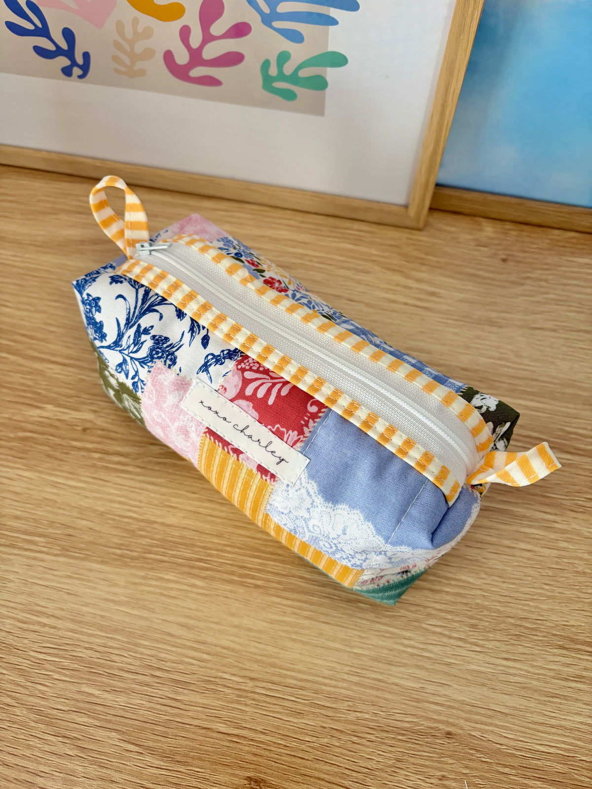 Colorblock picnic bag with blue and pink patchwork, yellow check trim, top handle