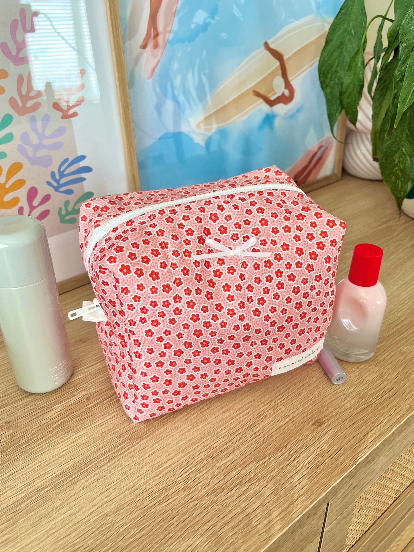 The Amelia Makeup Bag with white bow