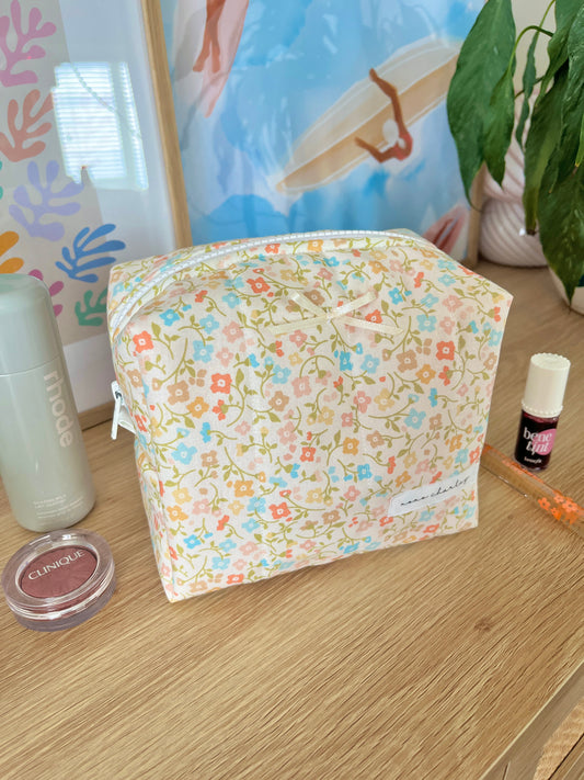 The Hailey Makeup Bag with yellow bow