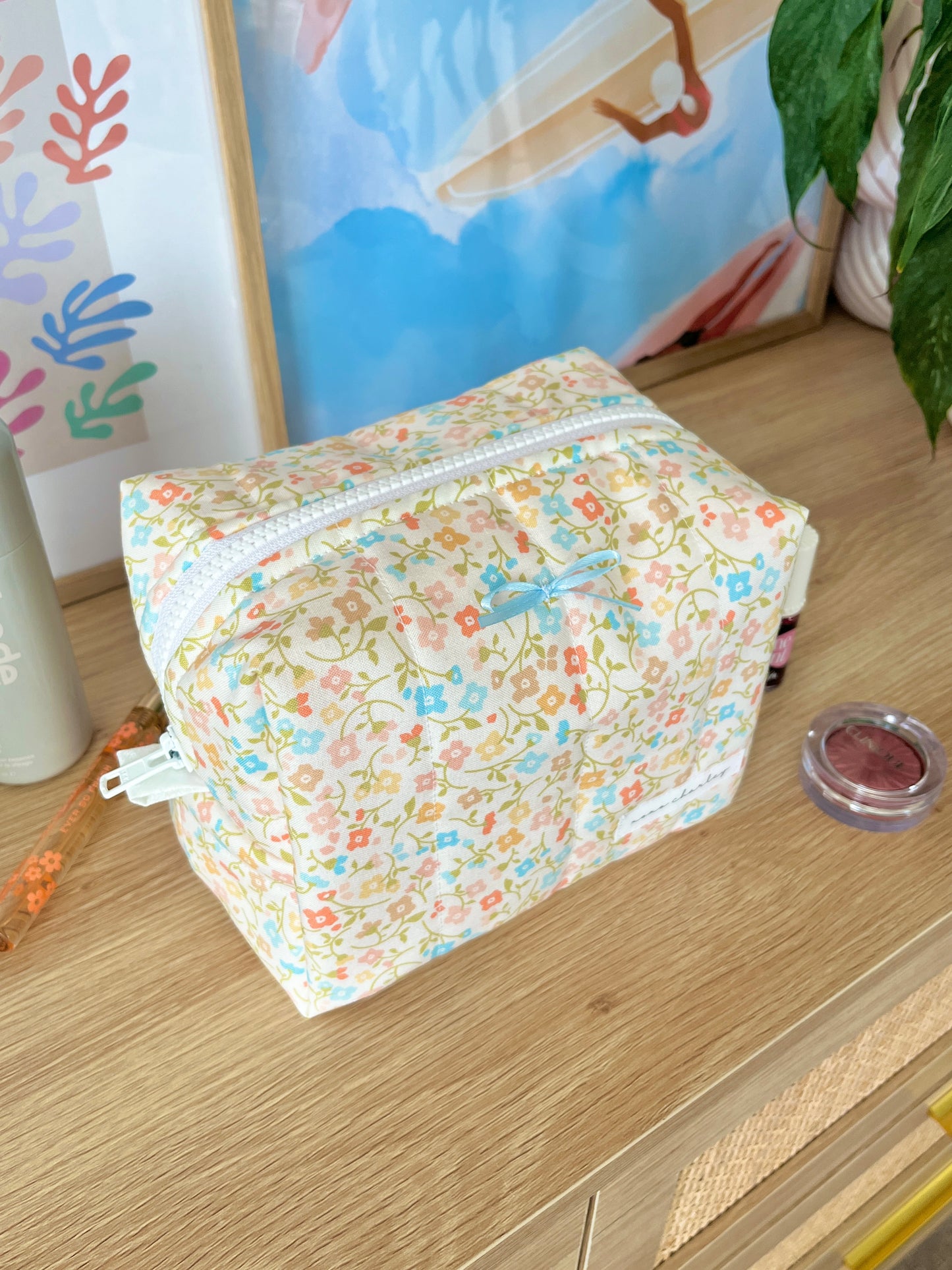 The Hailey Makeup Bag with blue bow