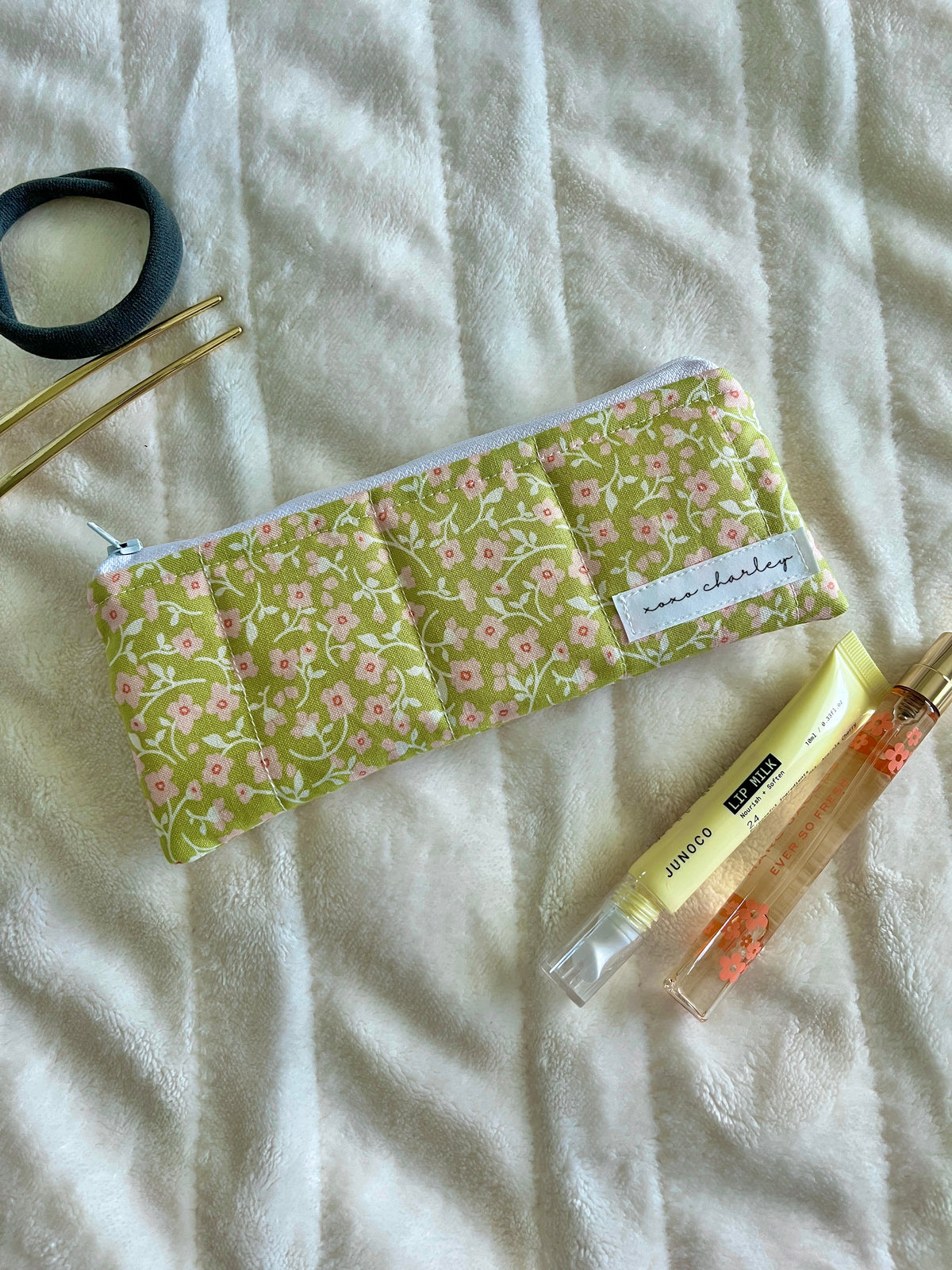 Peony pencil and glasses case, green floral zip pouch with yellow pen and label
