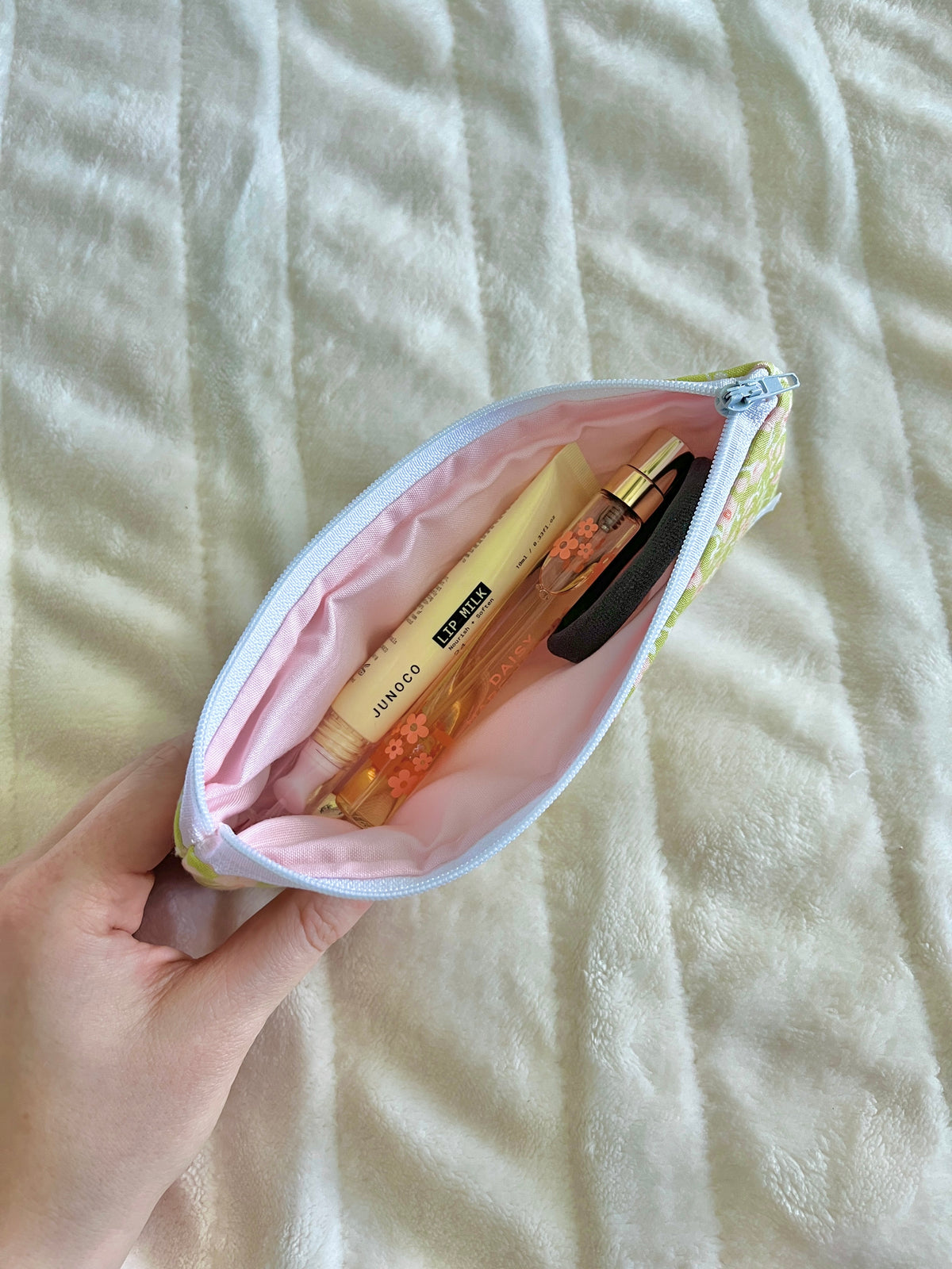 Peony pencil and glasses case, small zip pouch held in hand with pens inside