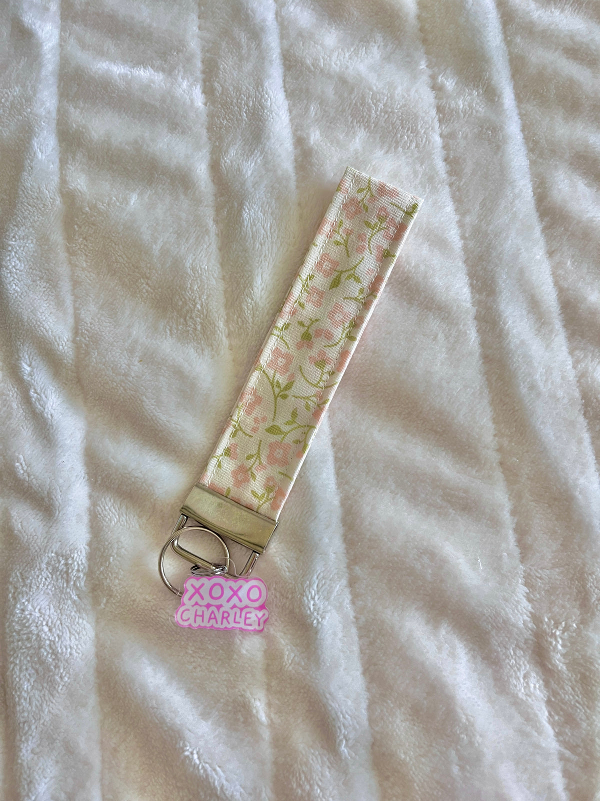 Floral keychain wristlet strap with gold clasp and round keyring, pastel fabric