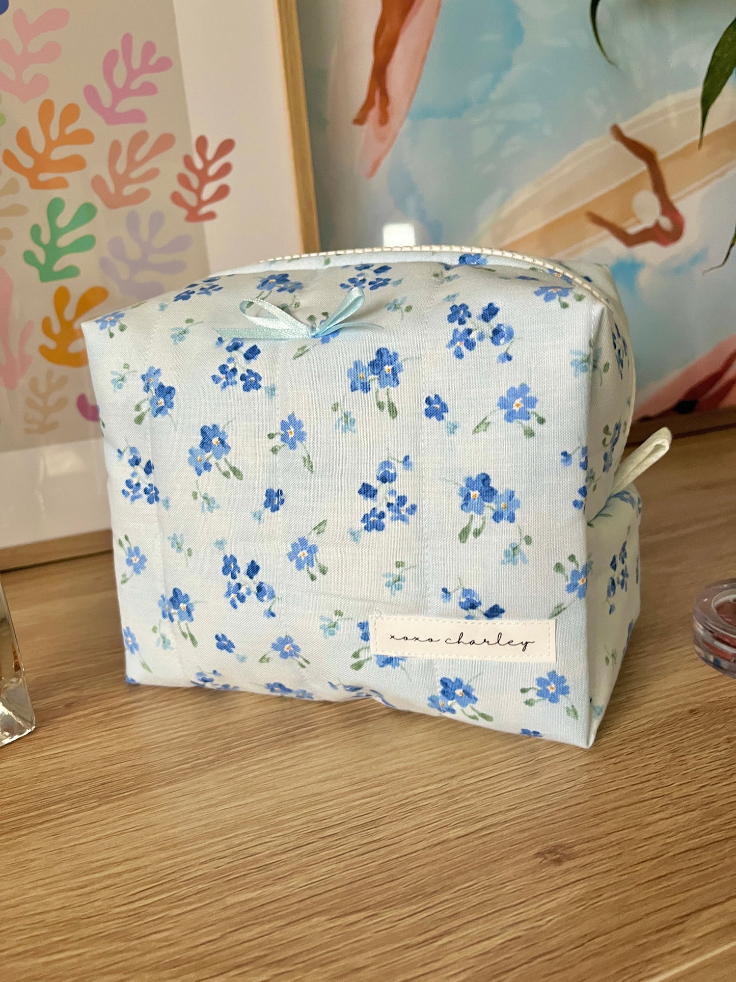 The Evelyn Makeup Bag with blue bow