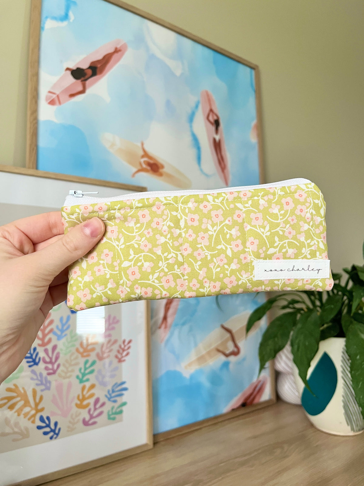 Peony pencil and glasses case, yellow floral zip pouch held in hand