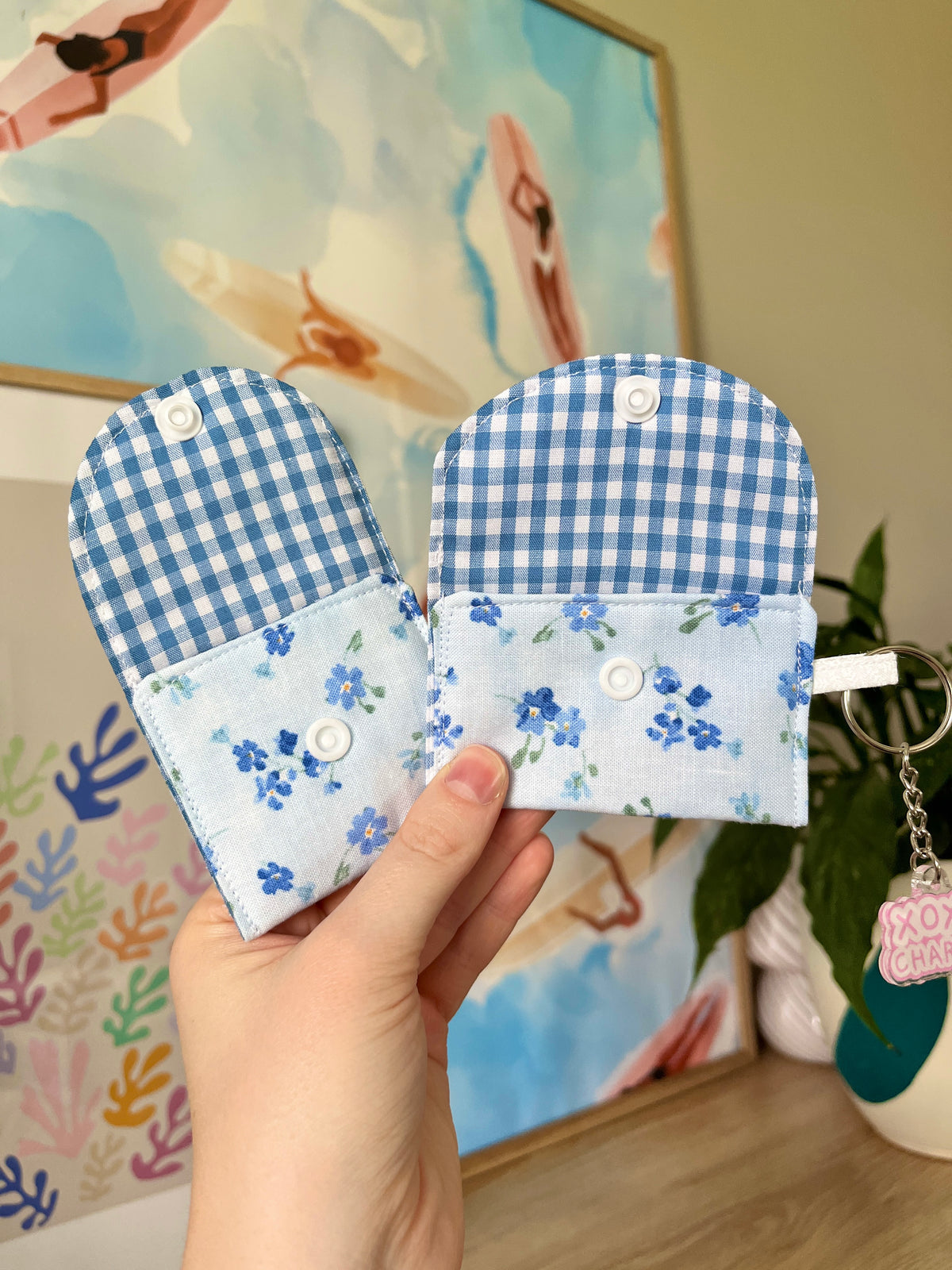Evelyn earbuds cases in blue gingham and floral prints, snap flap, keyring