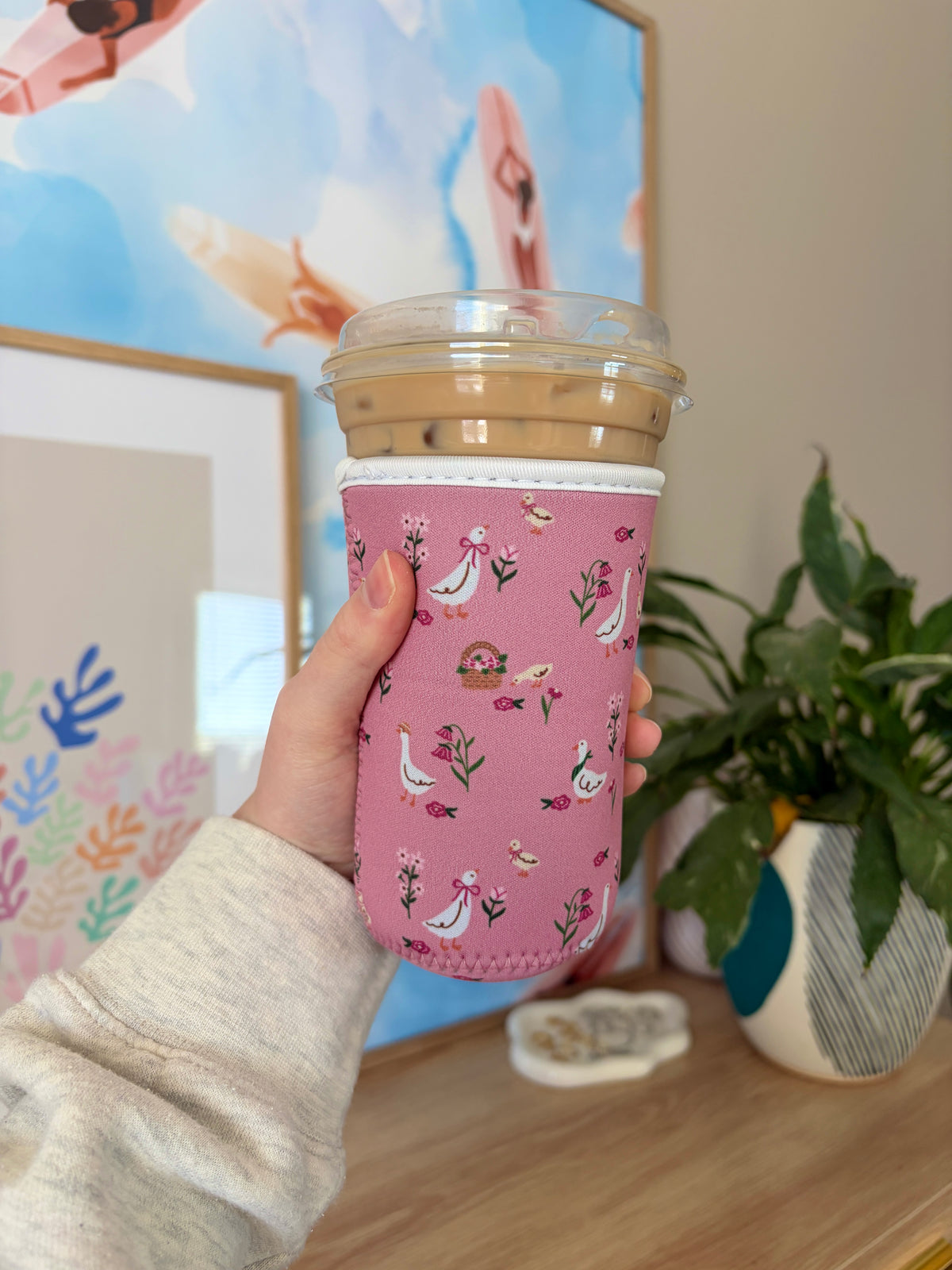 Pink spring geese cup coozie with illustrated birds and flowers