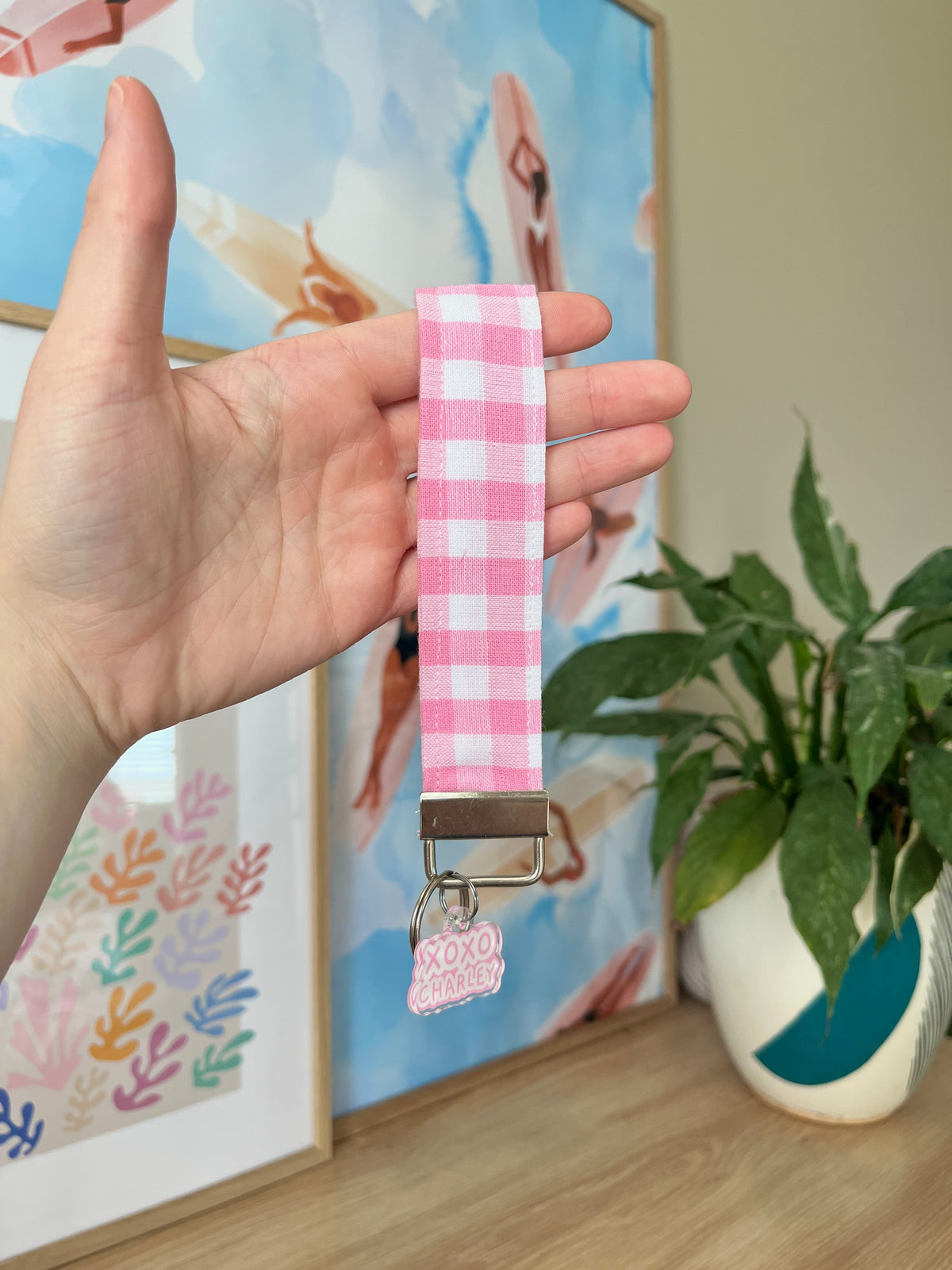 Pink gingham wristlet keychain with metal lobster clip and key ring