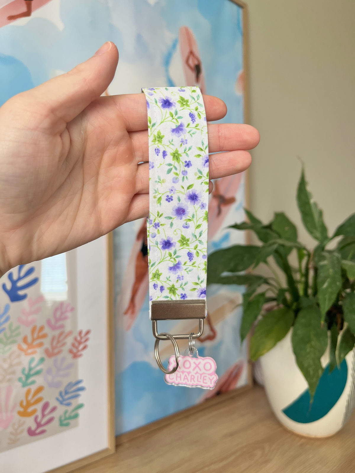 Purple floral fabric keychain wristlet with metal clip and ring
