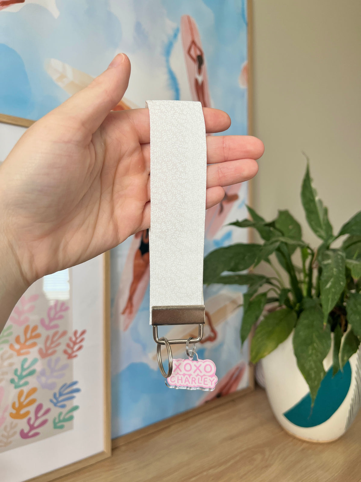 White wristlet keychain strap with lobster clip and metal ring