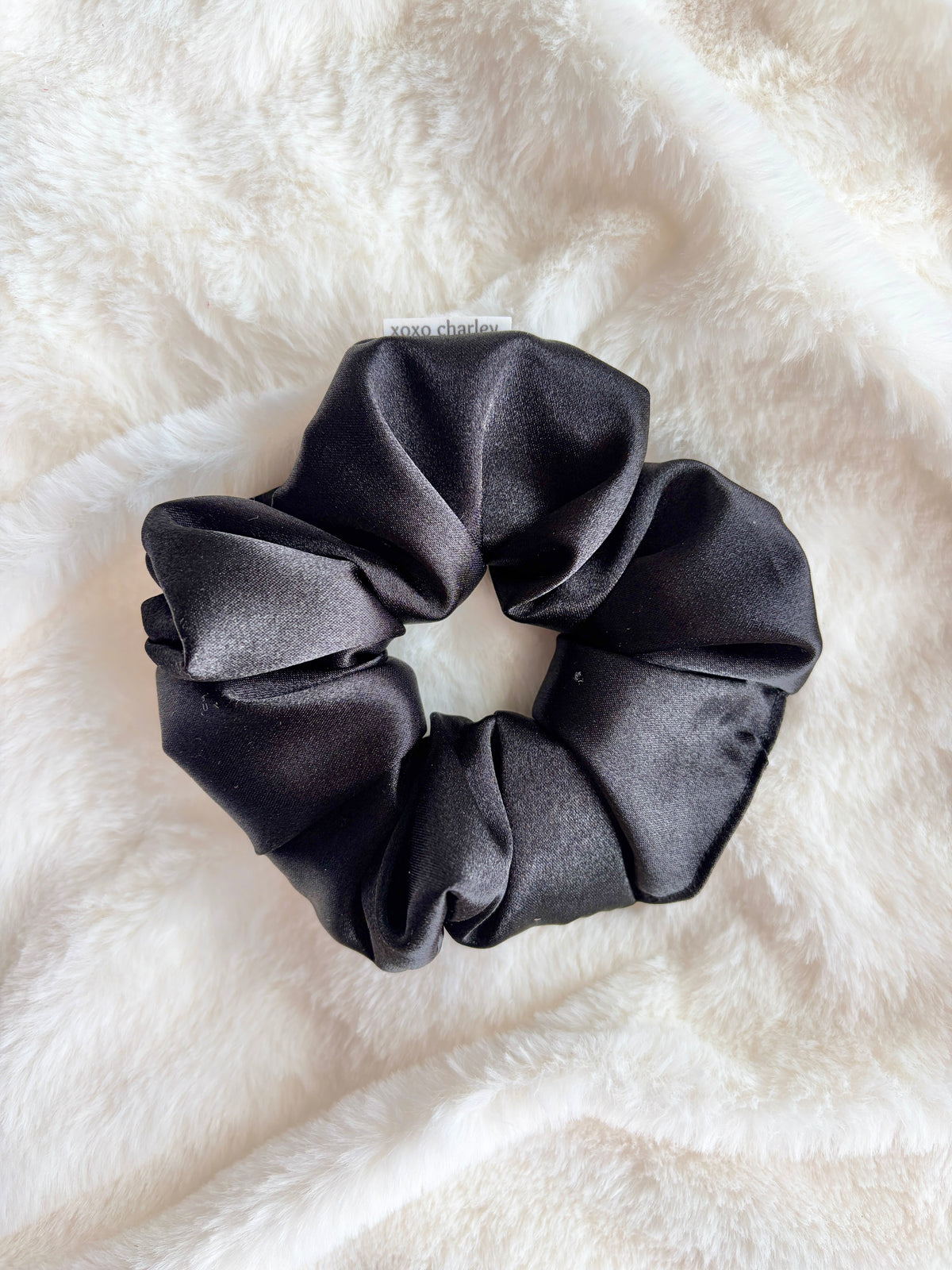 Large black satin scrunchie with gathered, ruffled center