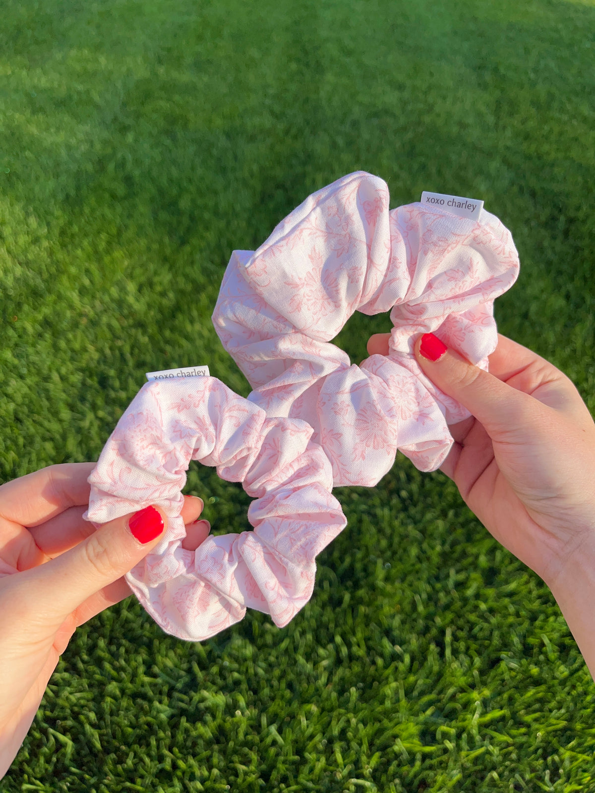 Vintage pink cotton scrunchie with ruffled scrunch detail, pastel swirl pattern