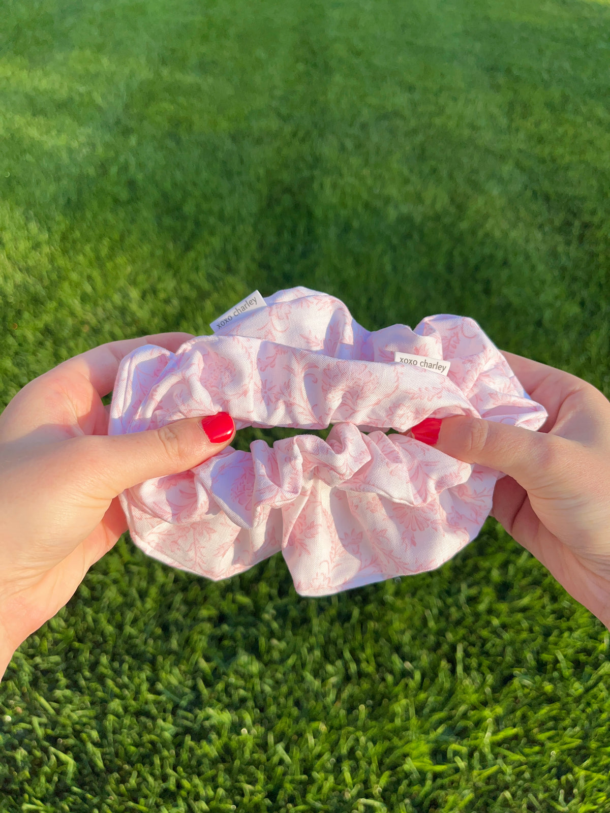 Vintage cotton scrunchie in pastel pink with gathered ruffle layers