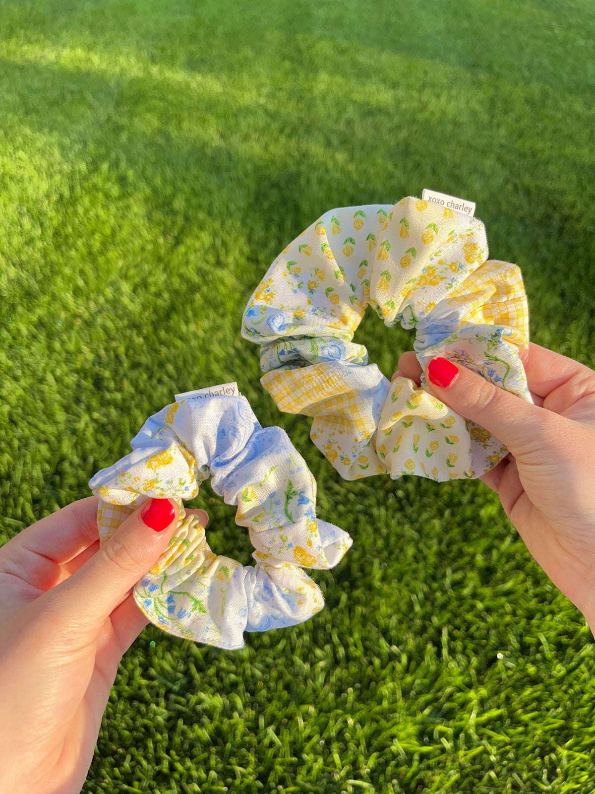 Cotton patchwork scrunchie in light blue, yellow, and green on white fabric.