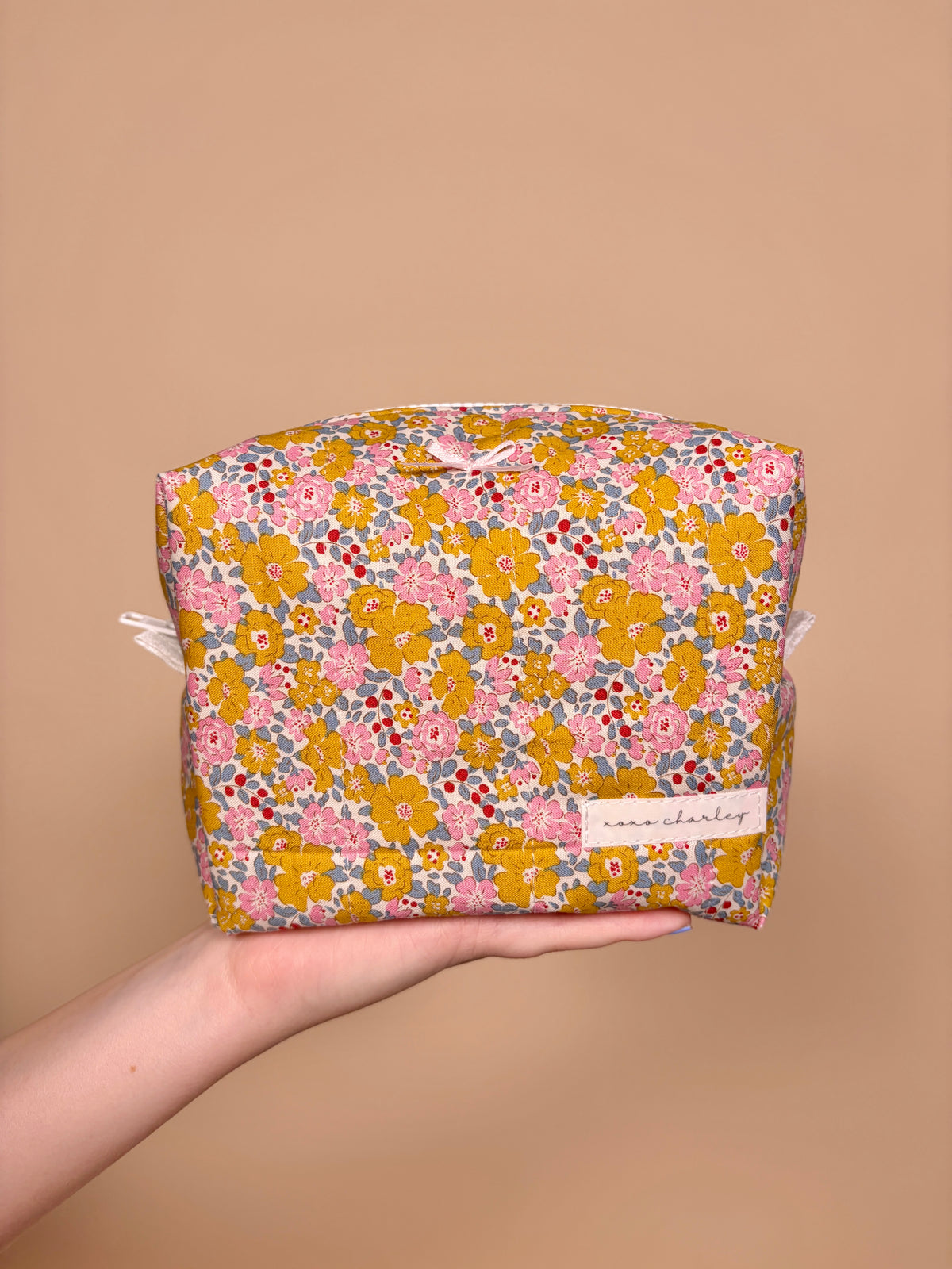 October Skies Bow Medium Makeup Bag *limited-edition*