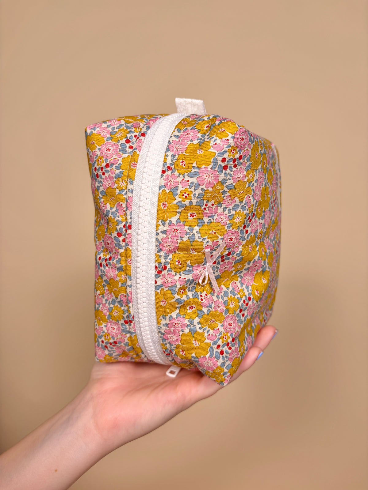 October Skies Bow Medium Makeup Bag *limited-edition*