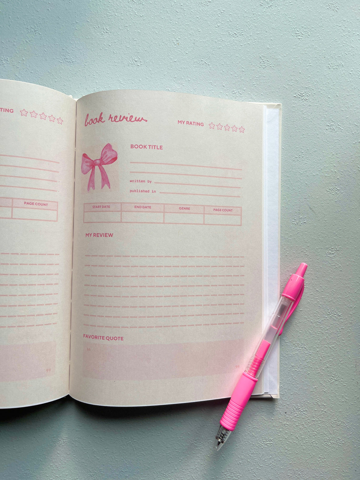 Open journal showing lined pages and “Look forward” section, with pink pen nearby.