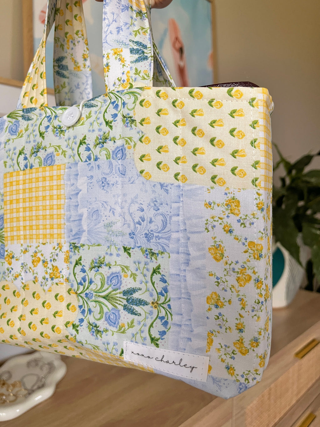 Patchwork Bible tote with front pocket and white button detail