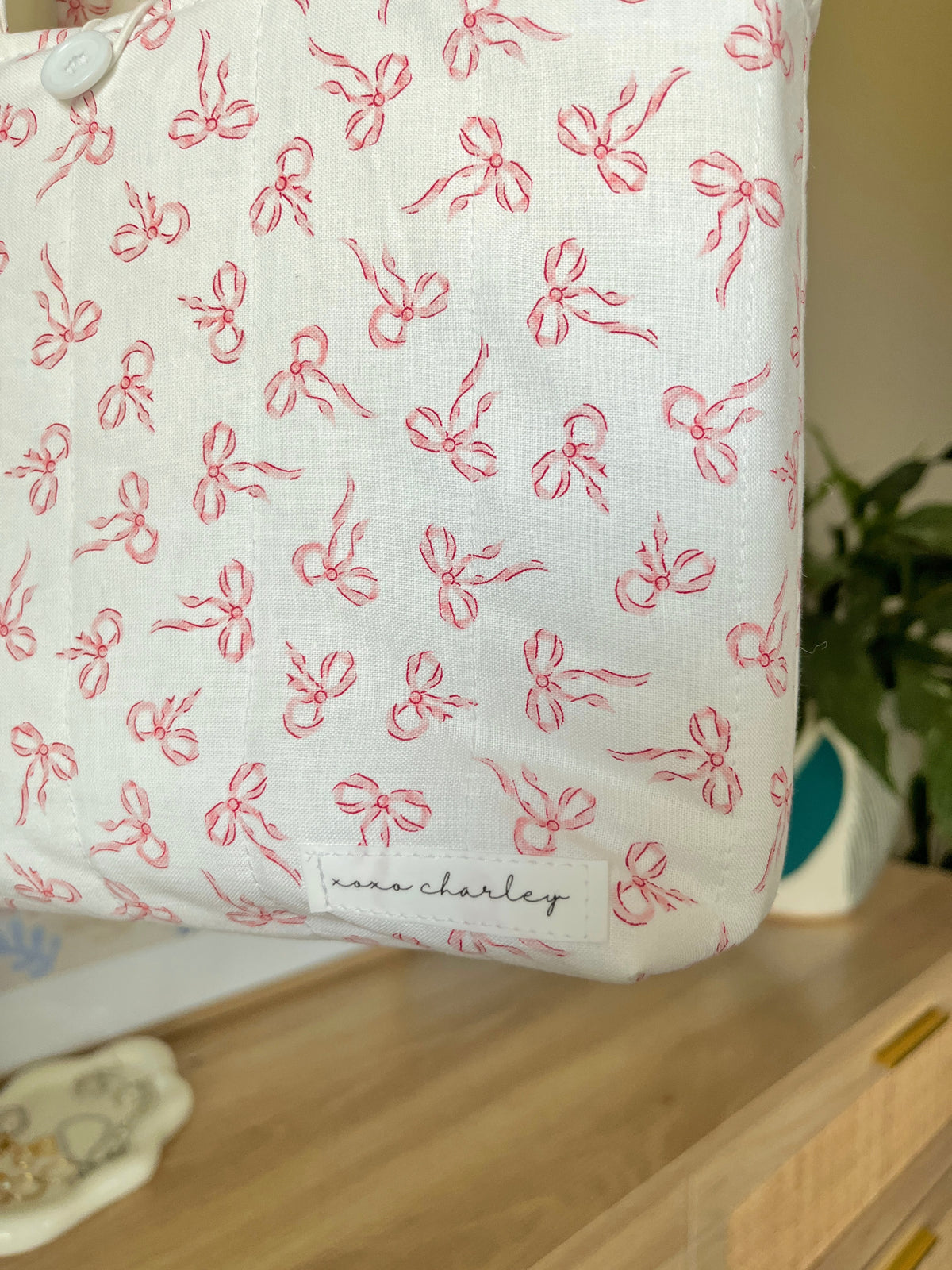 Mini bible tote bag in white with repeating pink bow pattern