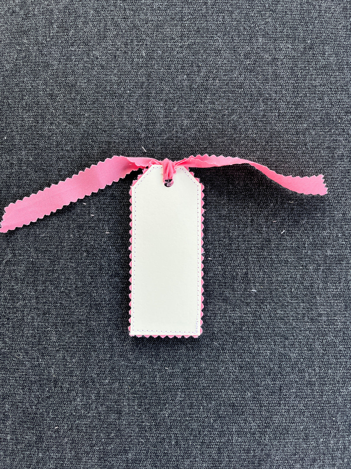 Blush pink ribbon gift tag with blank white card, scalloped edges and eyelet