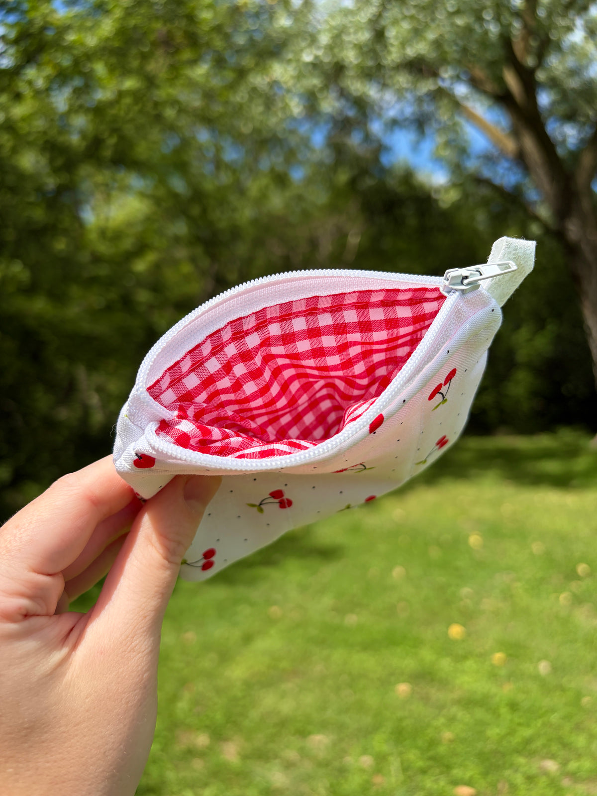 Cherry keychain wallet pouch open end, red gingham lining and zipper top