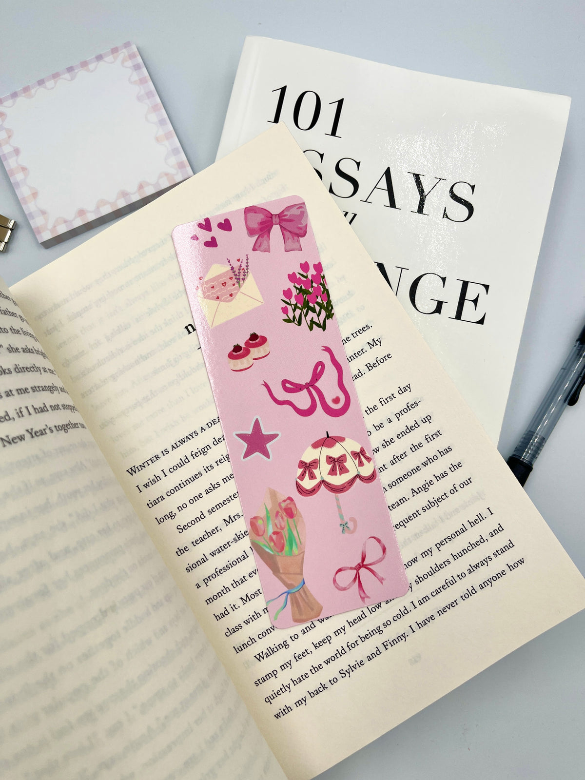 Pink scrapbook bookmark with layered gift-box bow and star stickers