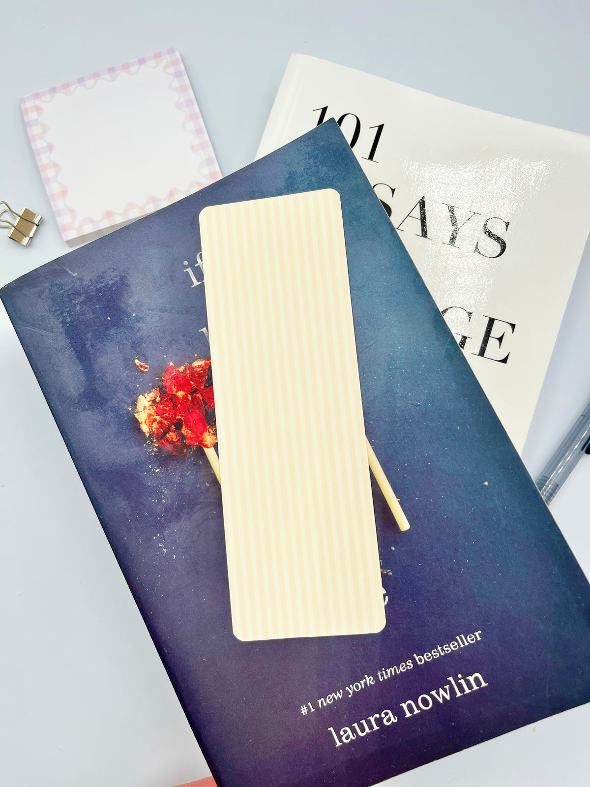 Yellow striped rectangular bookmark with a slim vertical cutout