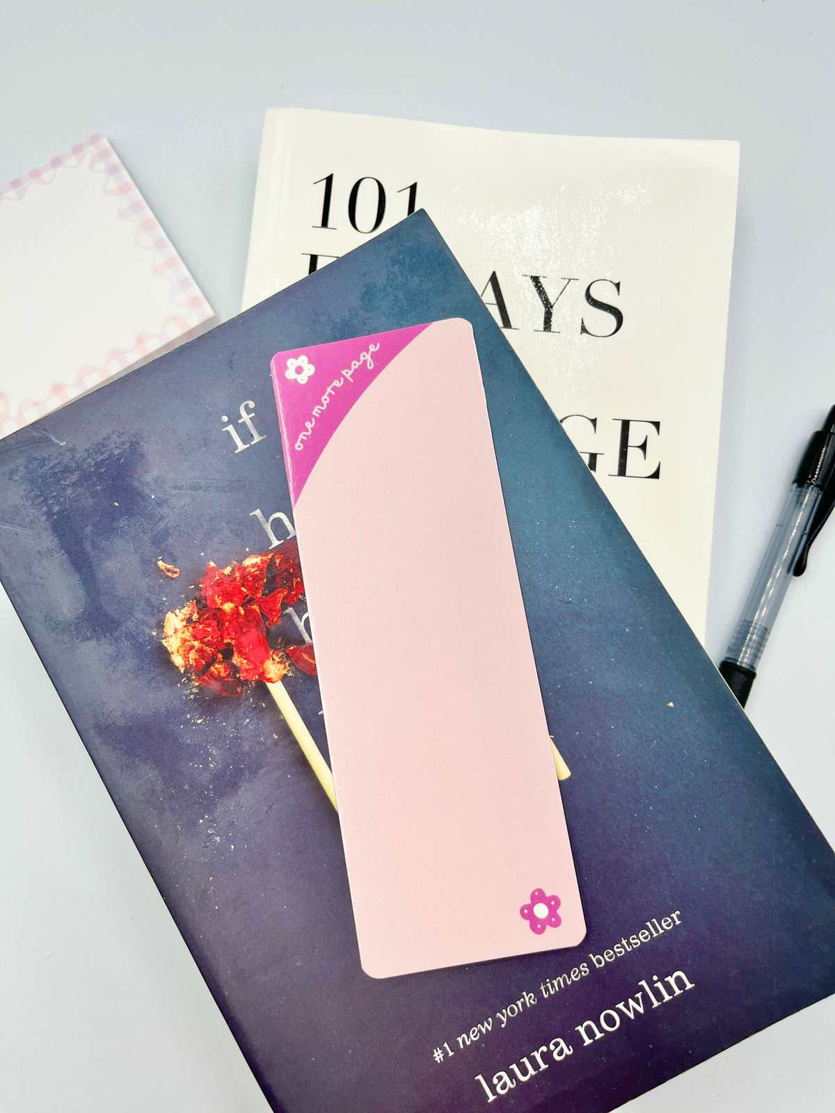 Purple bookmark with flower corner and pink center rectangle