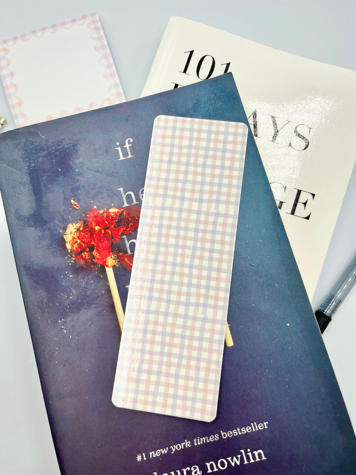Pastel gingham bookmark with light pink and blue check pattern