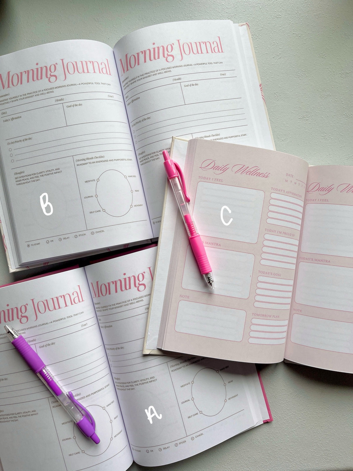 Journals displayed with A, B, and C